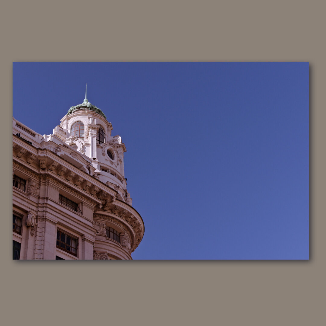 A building in front of the sky with a very special dome.