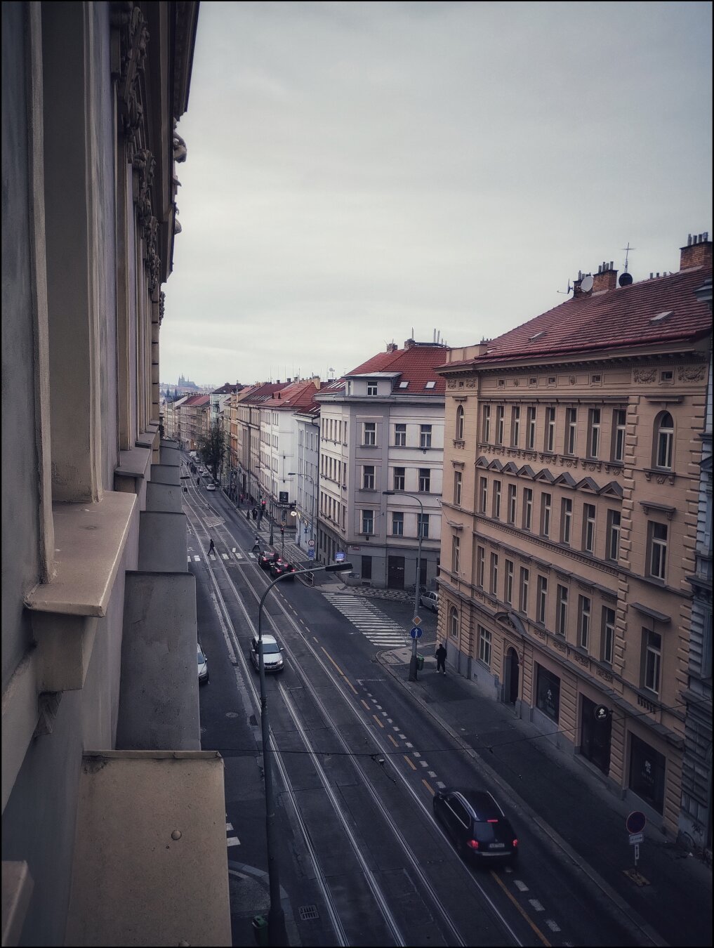 A photo shot above street level above a tramline in the Zizkov district of Prague.