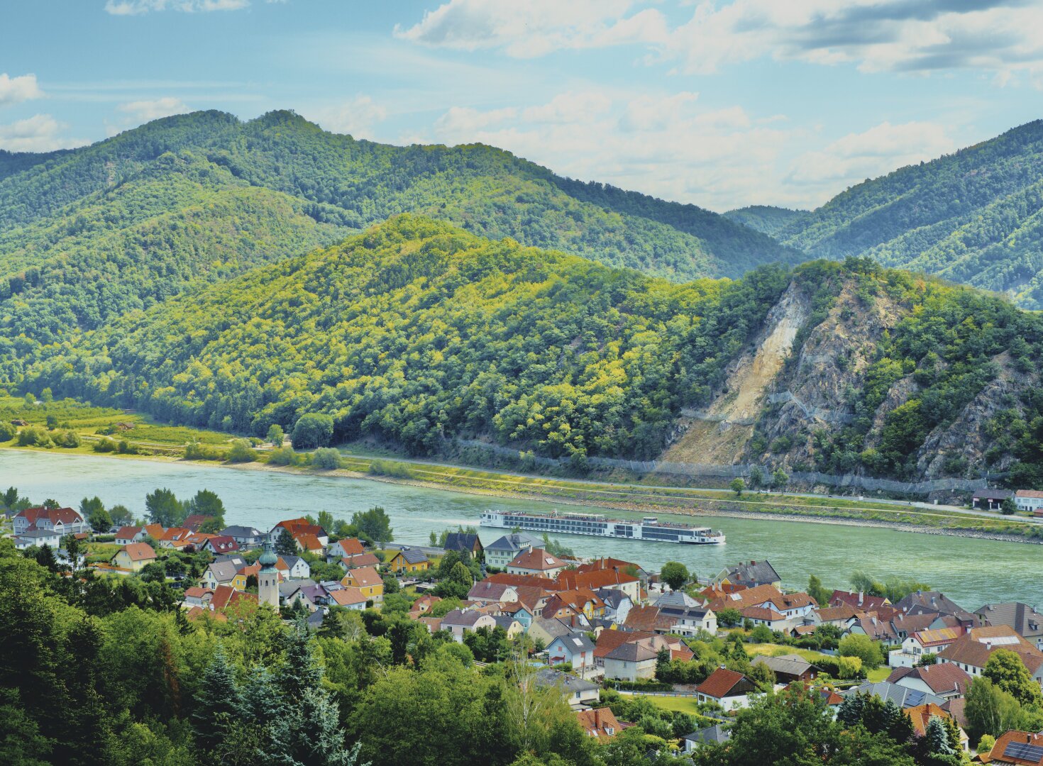 Summer Landscape with the danube and a ship in the wachau, austria