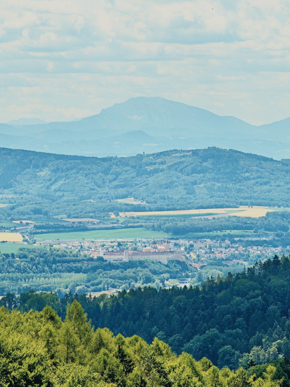 View of stift melk with the ötscher mountain in the background, lower austria