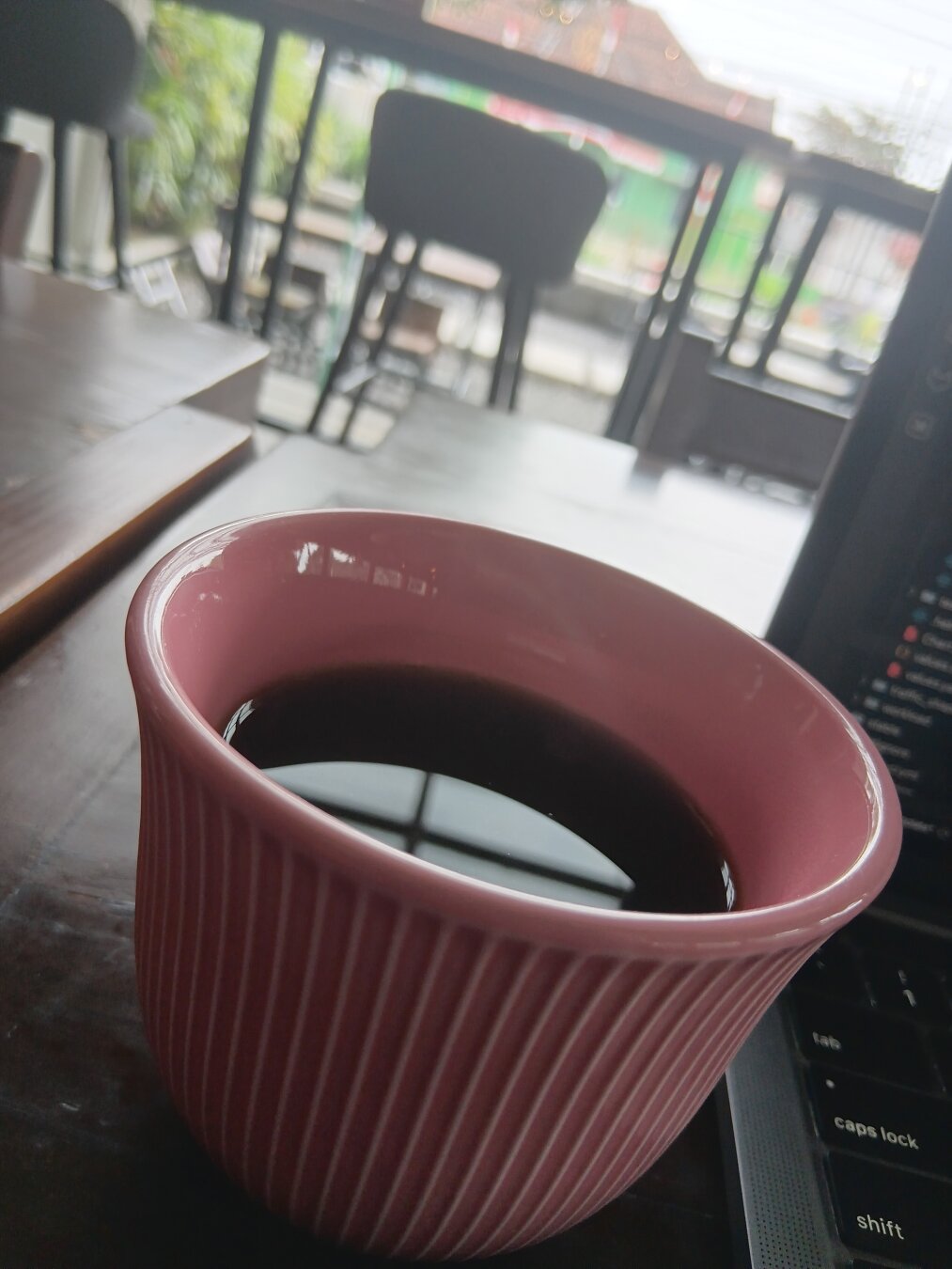 A cup of black hot coffee