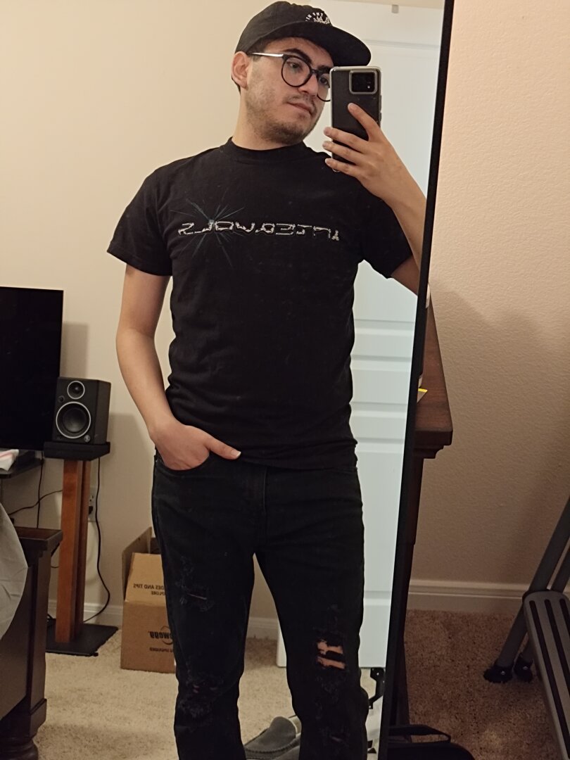 Front of my black Intervals 2025 touring shirt