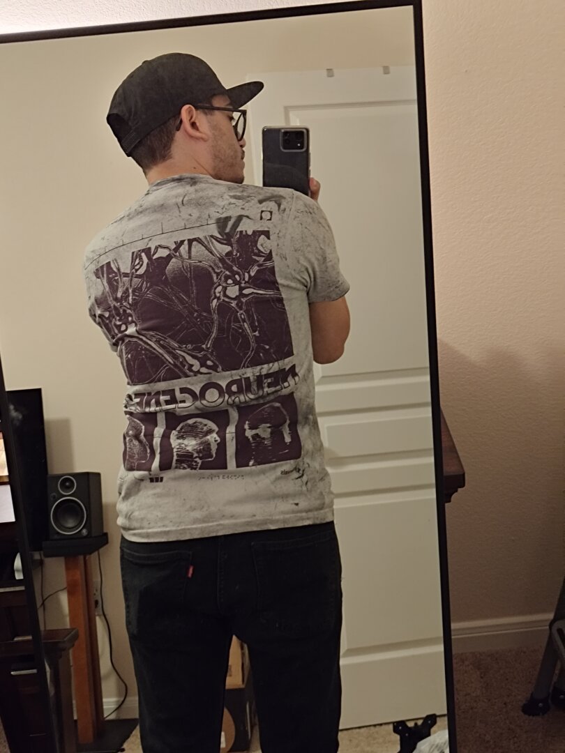 The back of the gray T shirt