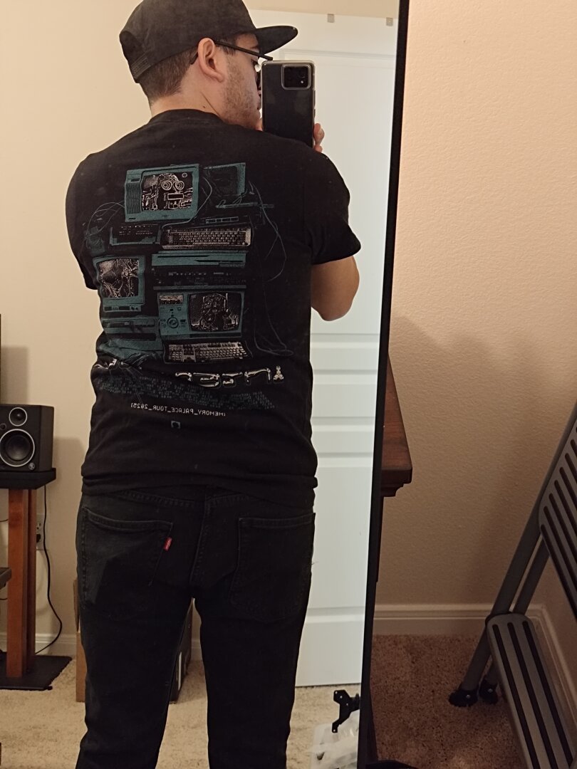 The back of the black Intervals touring shirt