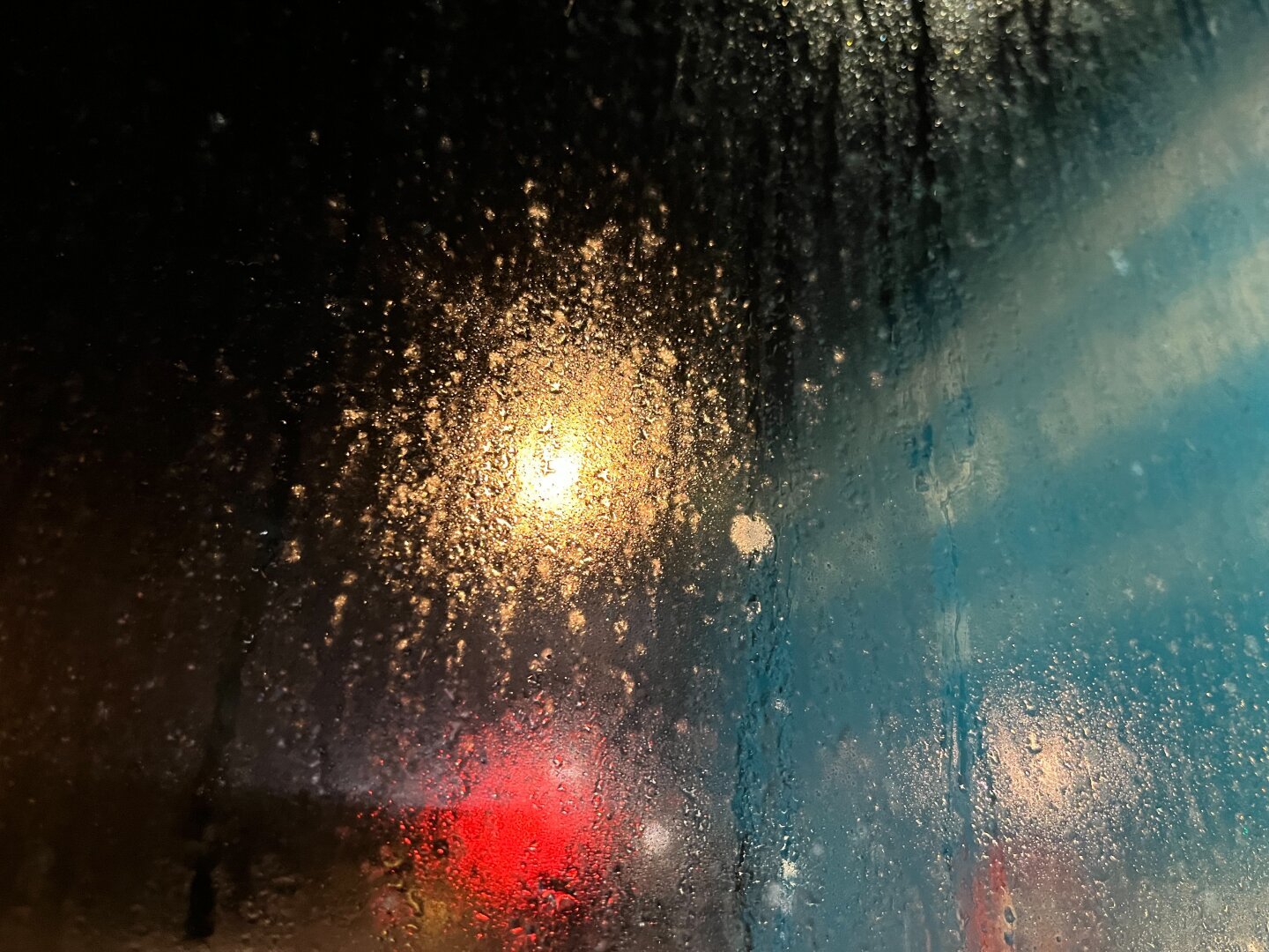 Night lights from a bus stall.