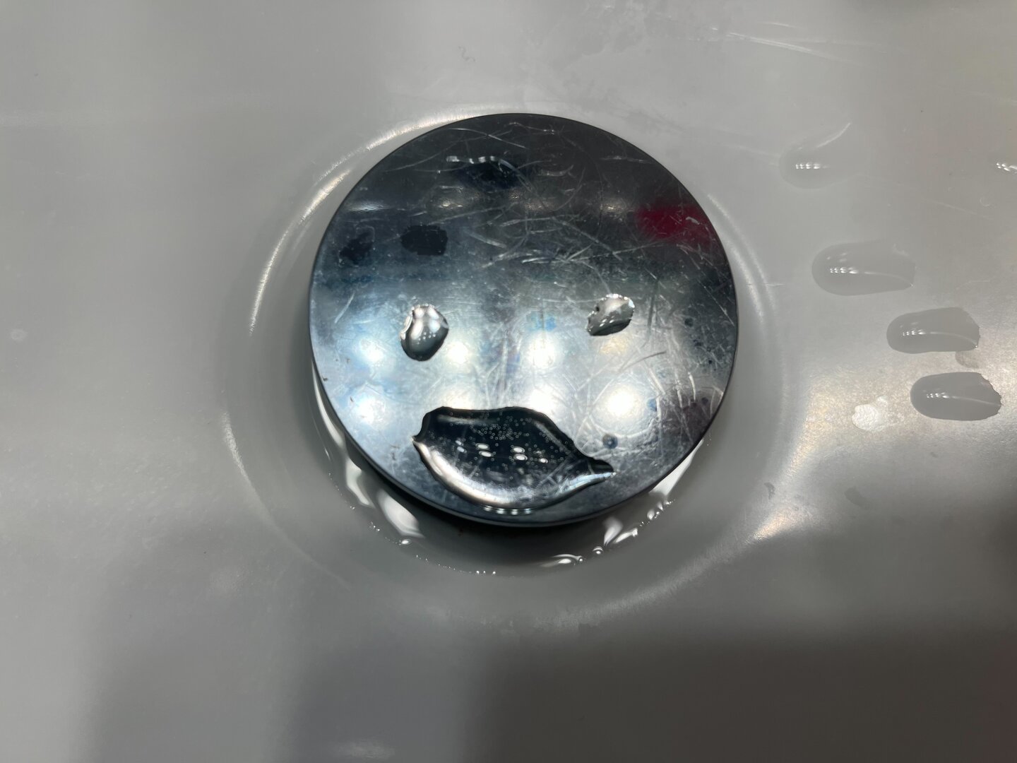 Drain looking like a face.