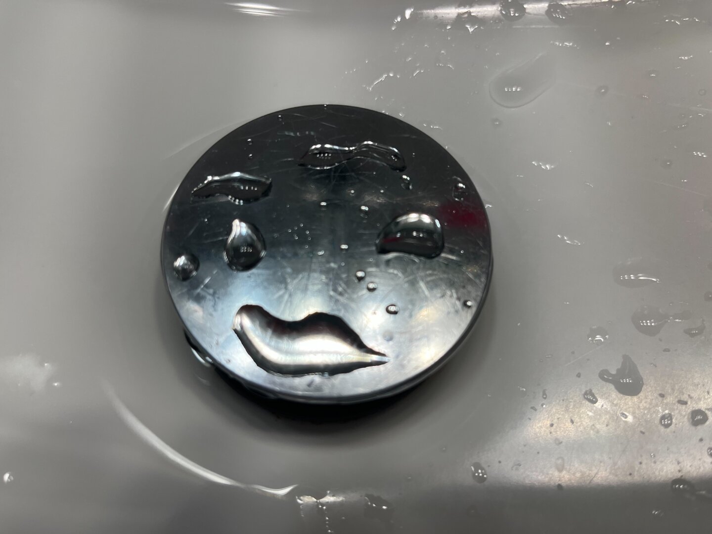 Drain face in a sink. Complete with eyebrows!