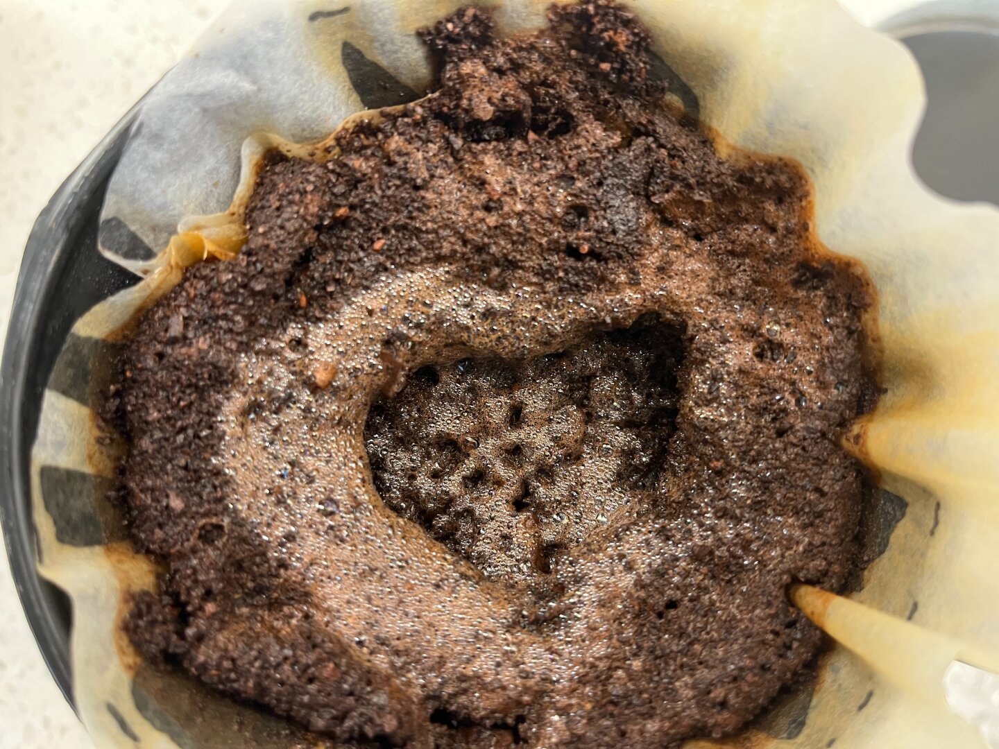 Heart shaped coffee grounds.
