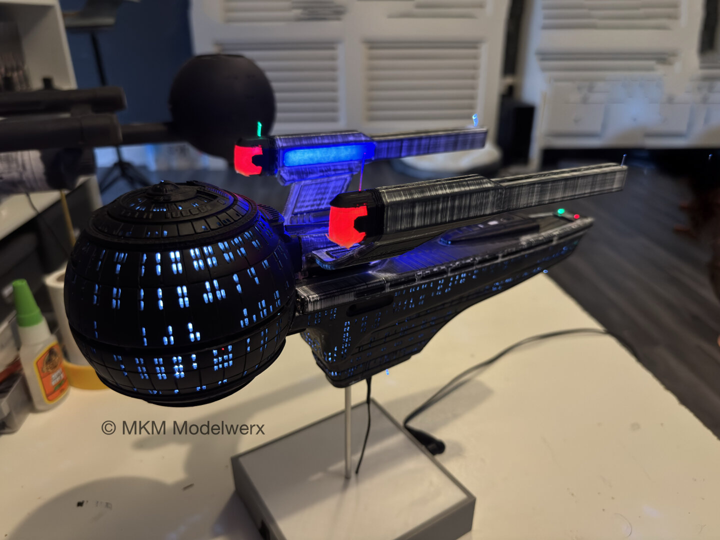 The model completely assembled and the lights switched on.
