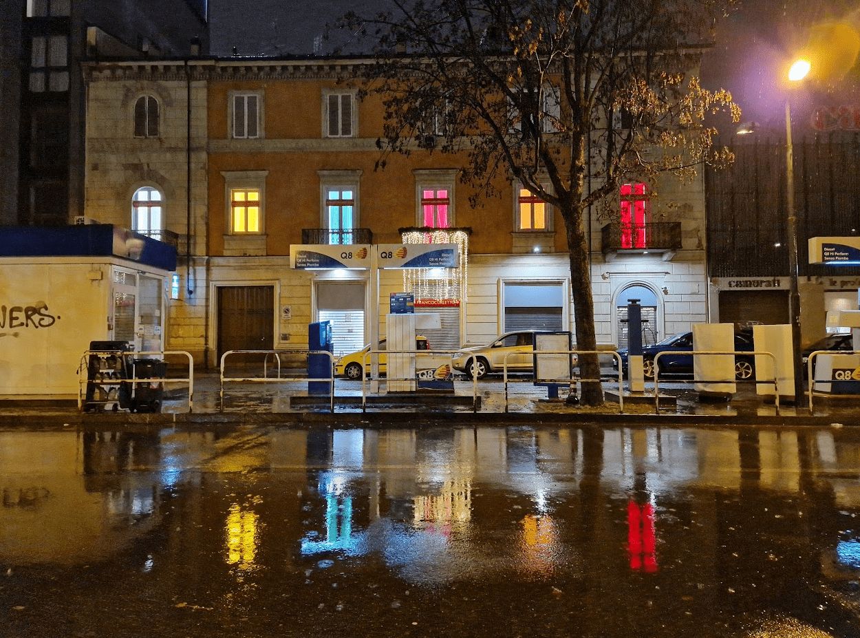 Colored windows in a rainy night