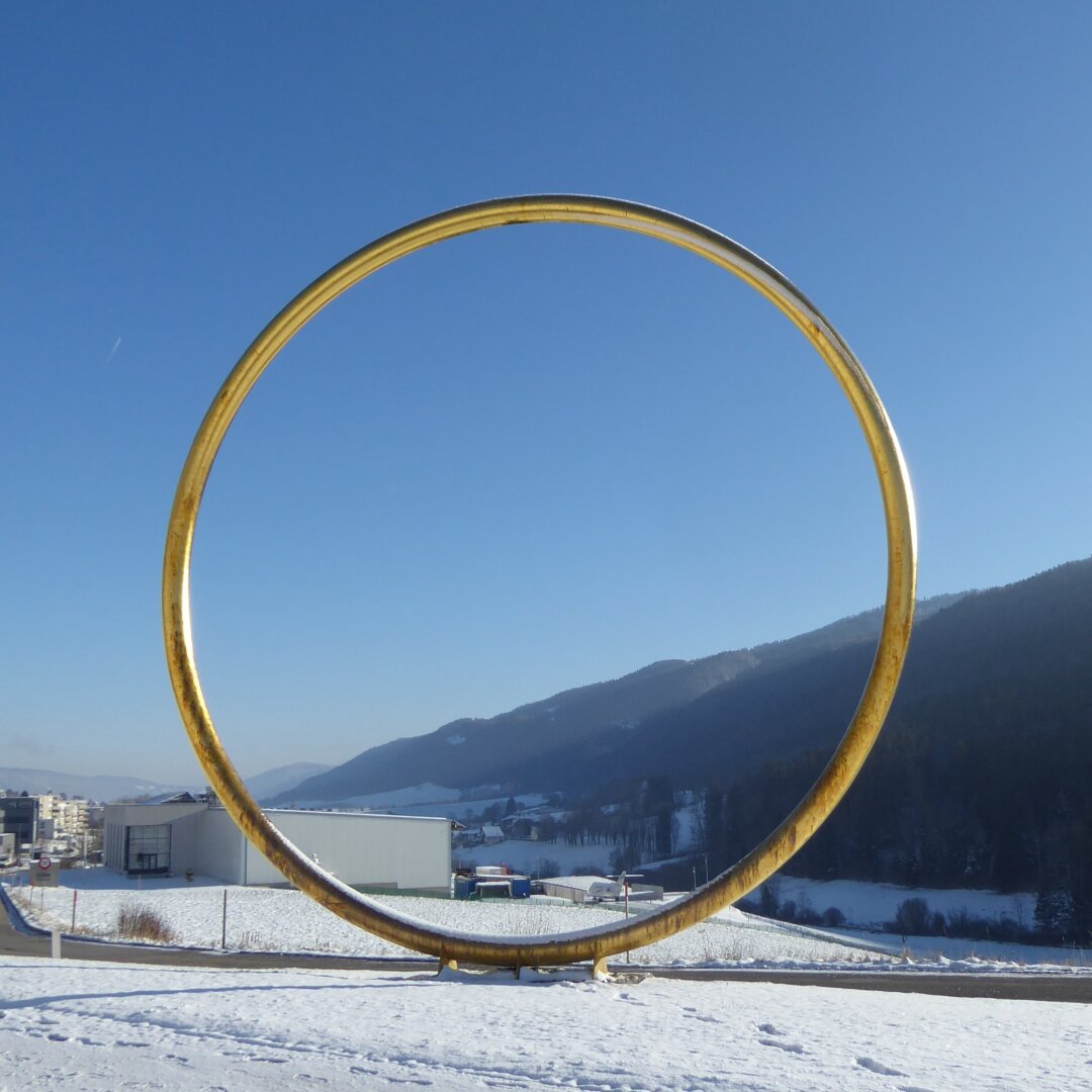 an image from my Pixelfed (because, fuck instagram), shows a stupid golden ring that stands in a snowy landscape