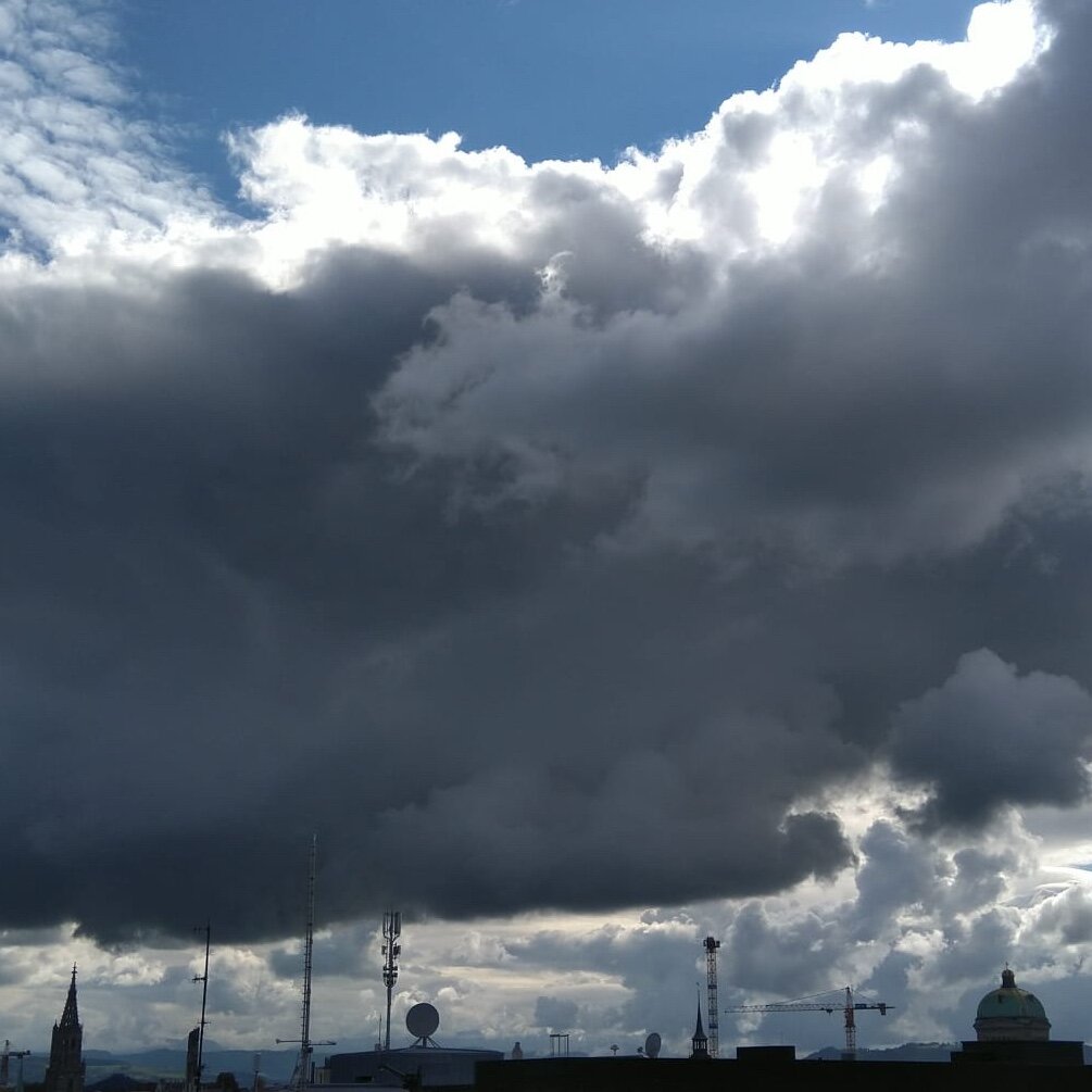 an image from my Pixelfed (because, fuck instagram), shows dark clouds above the city of Bern