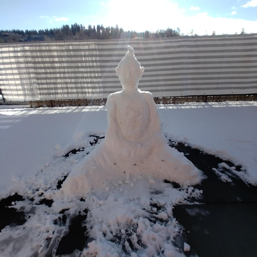 an image from my Pixelfed (because, fuck instagram), shows a buddha statue made from snow