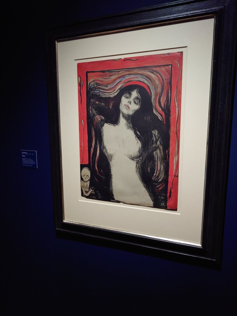 Madonna by Edvard Munch. A framed picture of a naked woman.