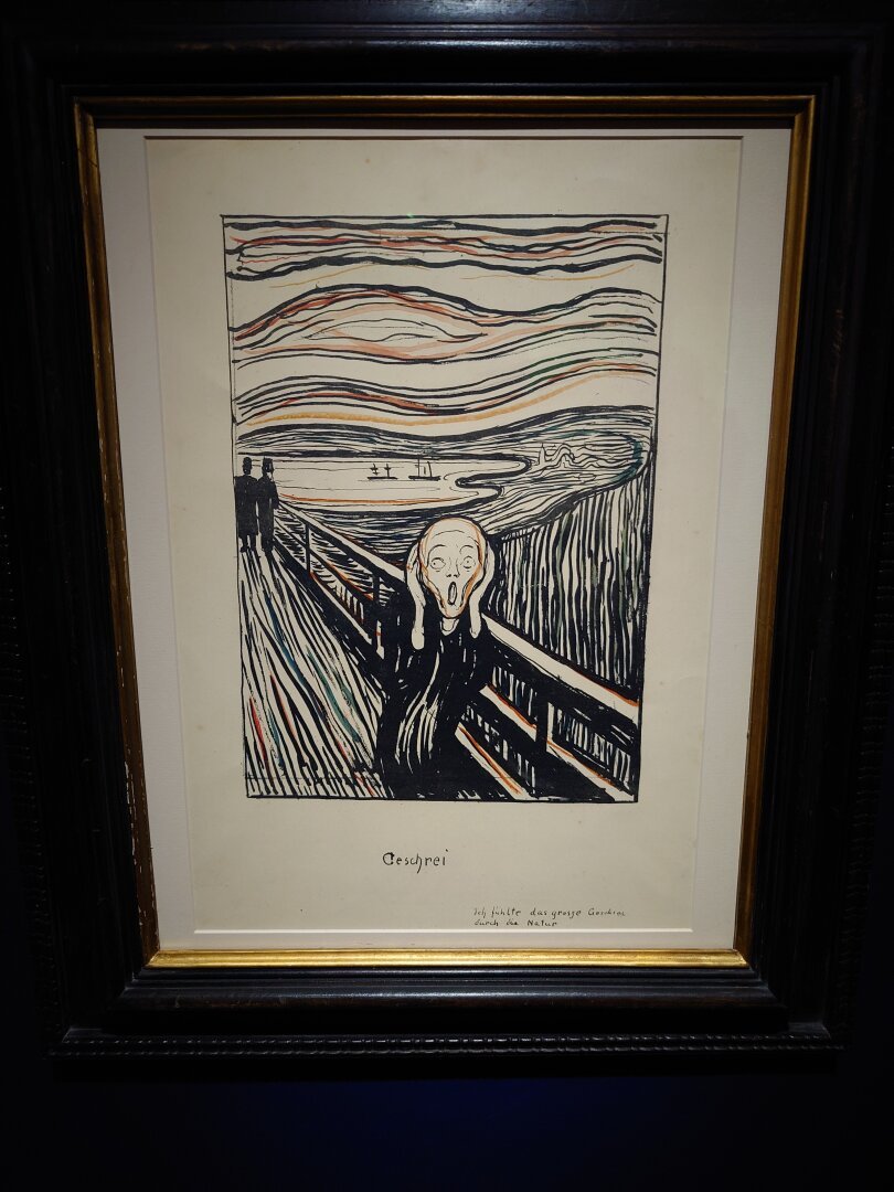 Skrik by Edvard Munch. Maybe his most famous picture. A person screaming under a red sky.