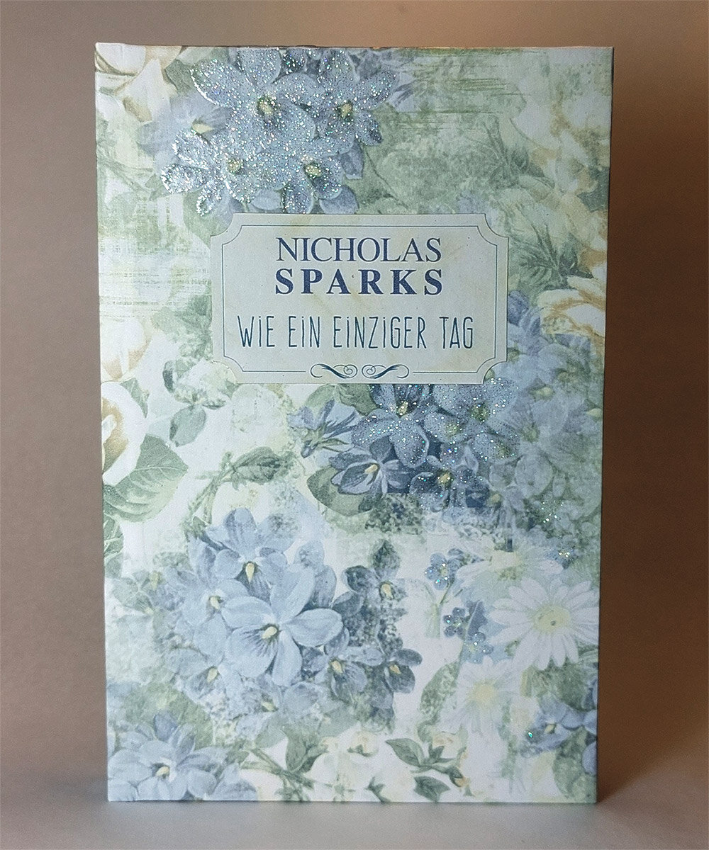 Book cover with light blue flowers