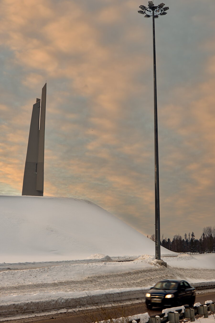 Car in front of WWII monument