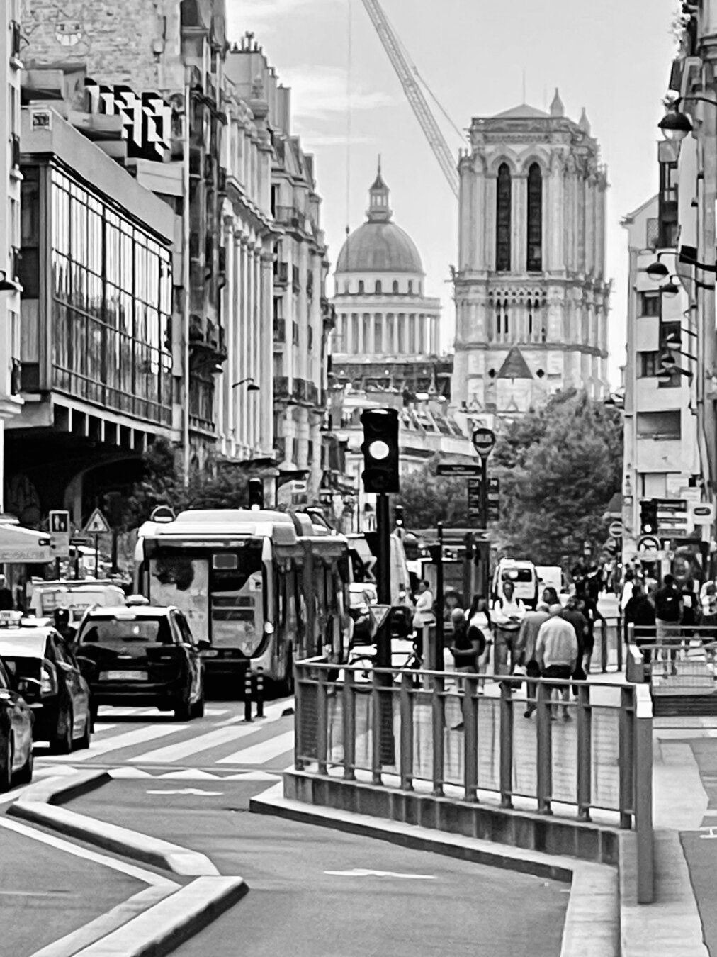 Black and white picture. Normally the Pantheon cupola is hidden by Notre Dame. Since the fire we can see it.