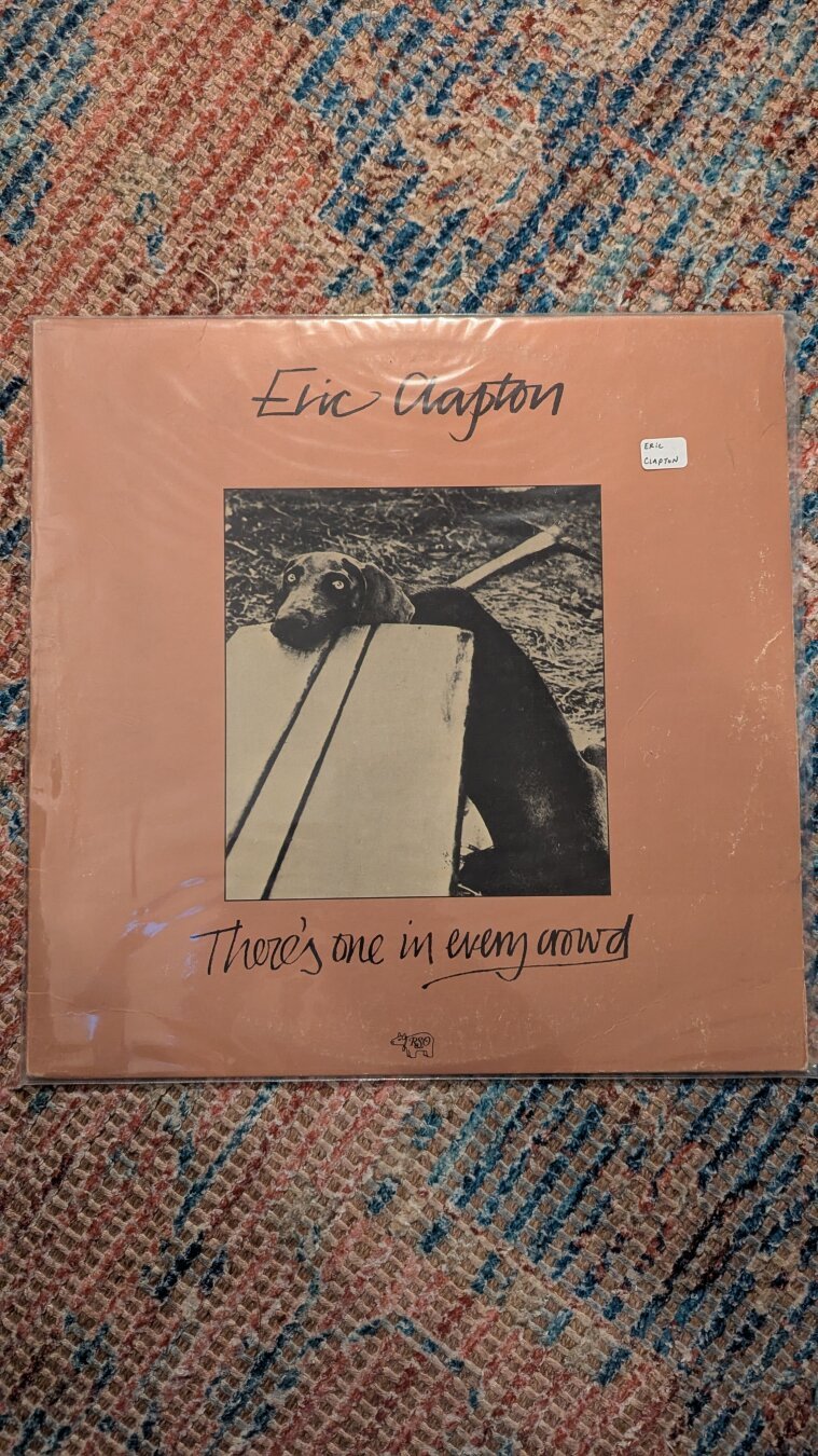 Cover of the vinyl Eric Clapton There's One In Every Crowd.