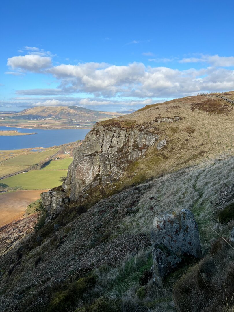View to Loch Leven from Benarty Hill. Cliffs in the foreground.