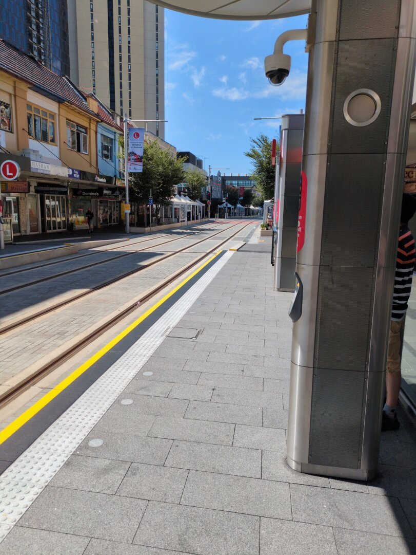 Waiting for the tram on Church St, which is the main dining precinct in Parra.