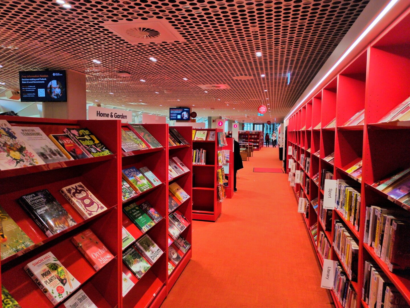 More bookshelves with books on display.