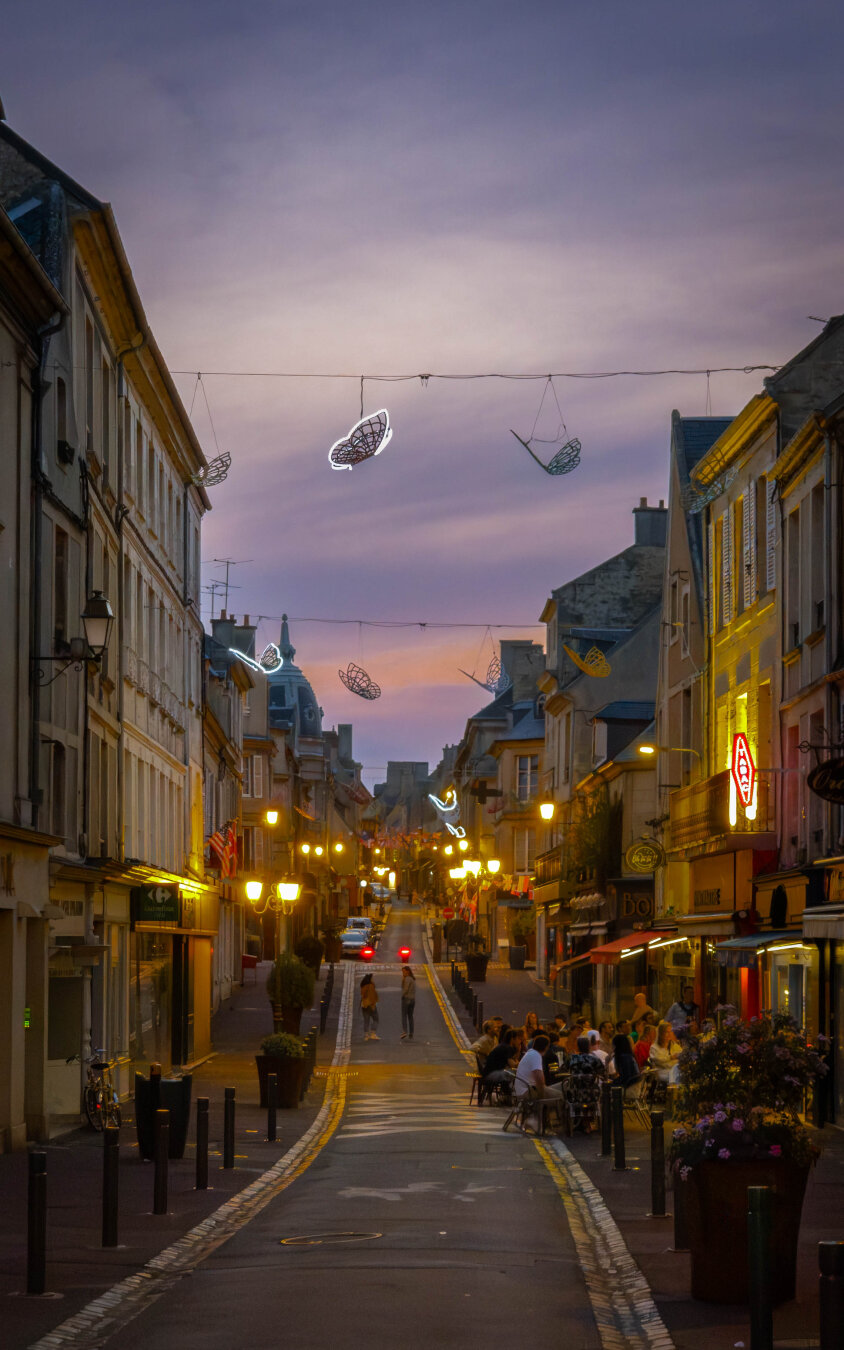 Evening scene from urban life in Bayeux, France.