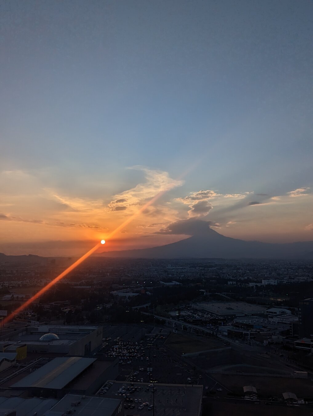 Looking west at sunset from Torres UMA building in Puebla