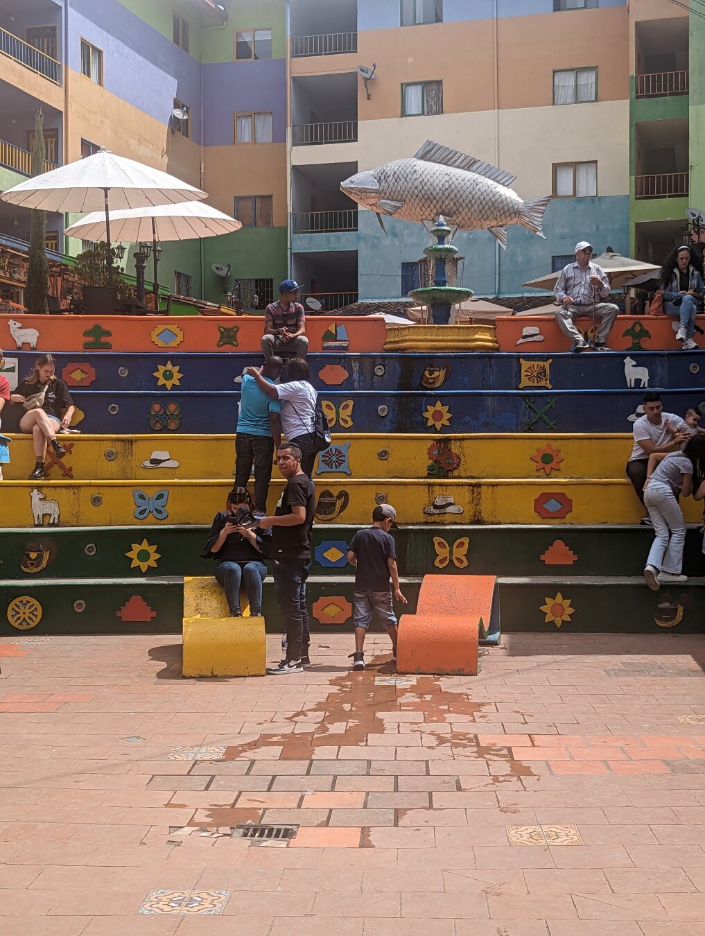 Colorful stairs with umbrellas