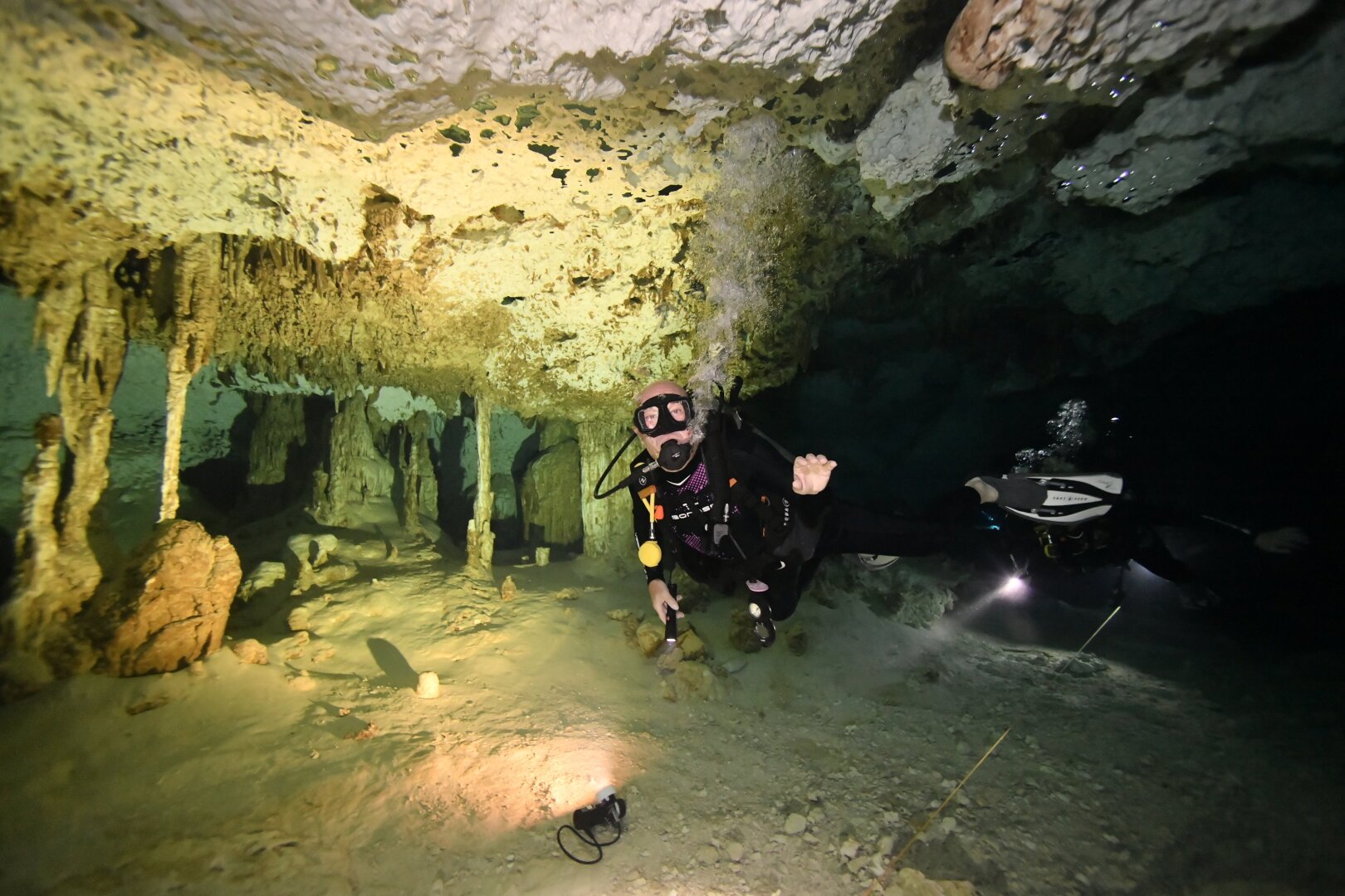 A well-lit cave diving shot
