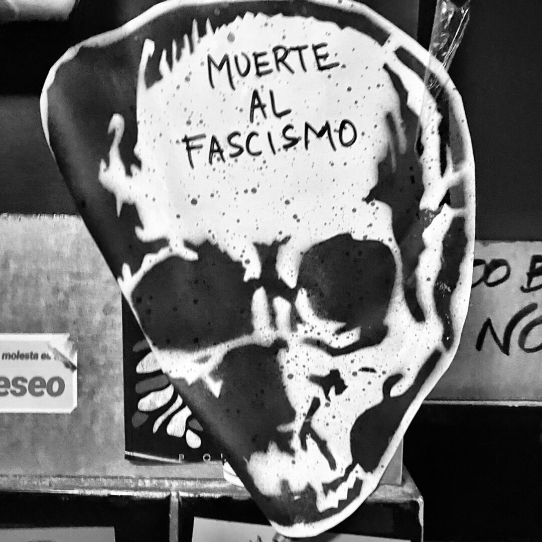 Sticker of a skull with massage that reads: “Muerte Al Fascismo” (English translation: Death To Fascism).