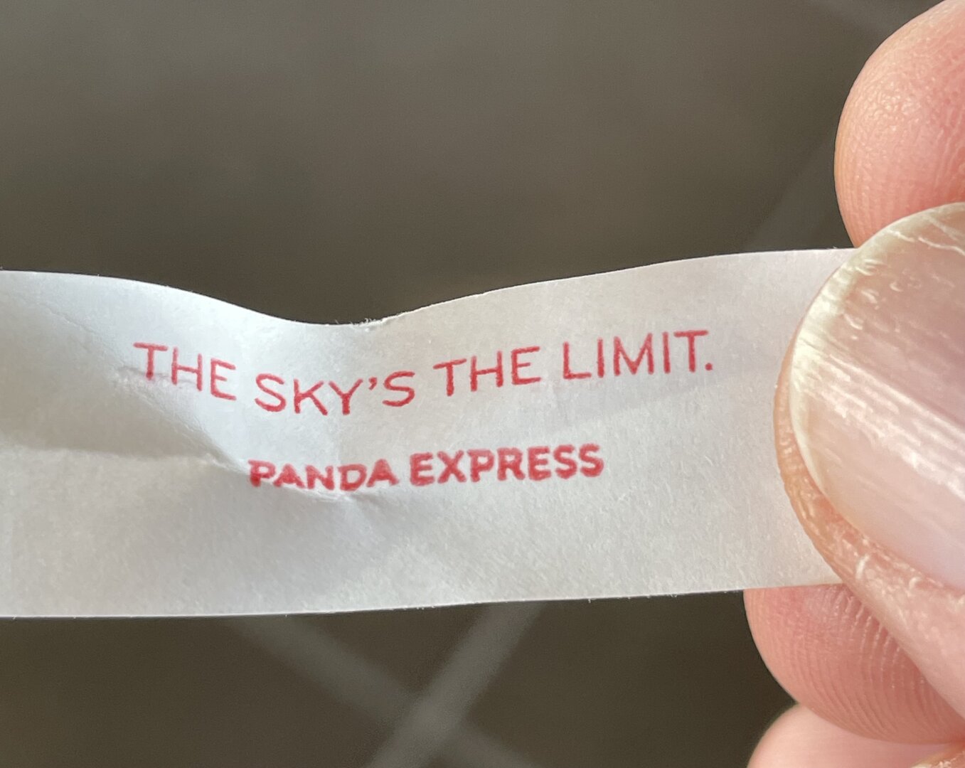 Fortune cookie slip saying, “The sky’s the limit.”