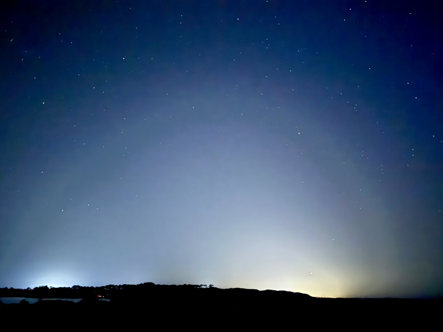 Night sky, starfield, cityglow.