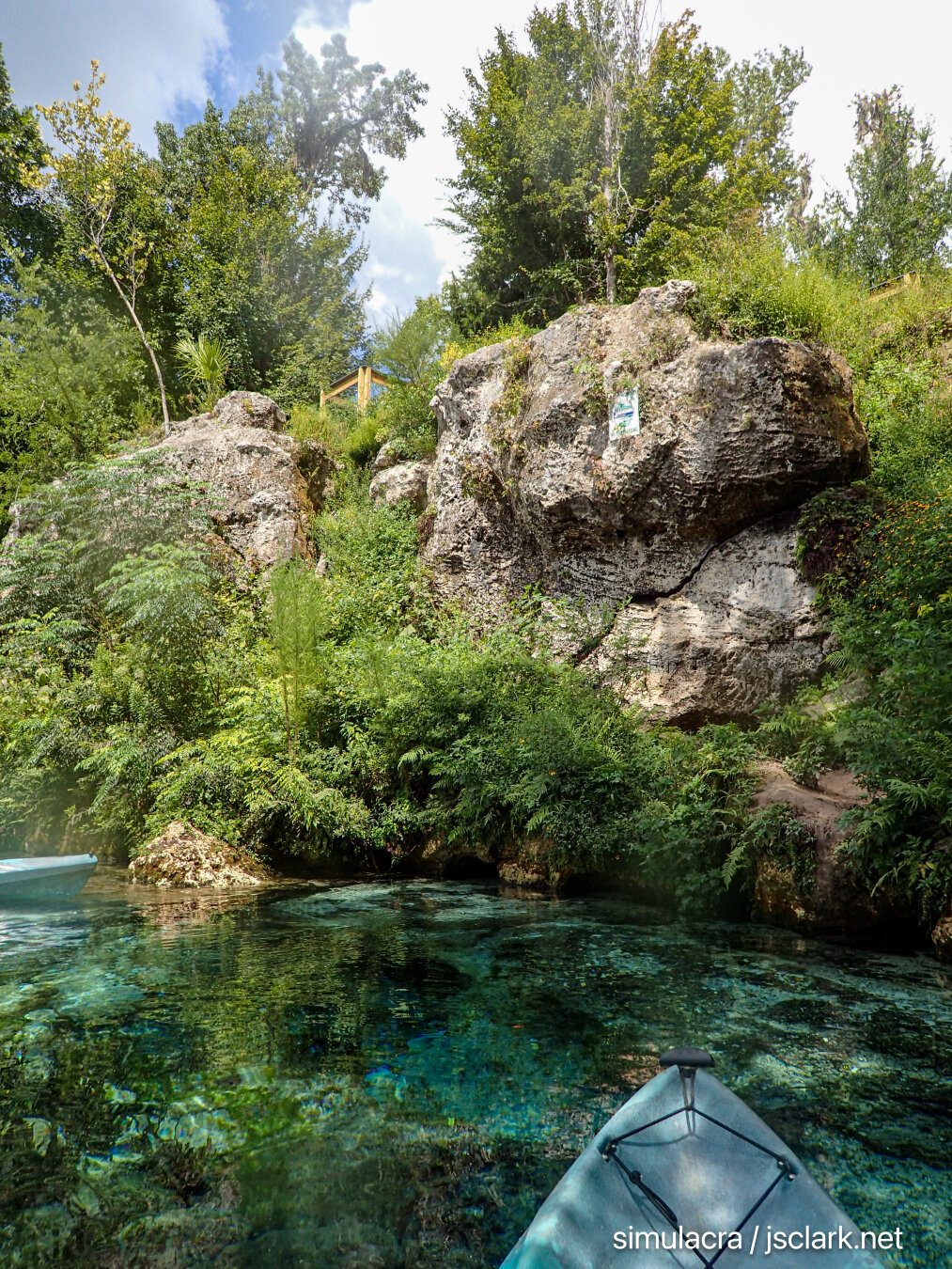 The rocky limestone bluff above Shangri-La Spring.