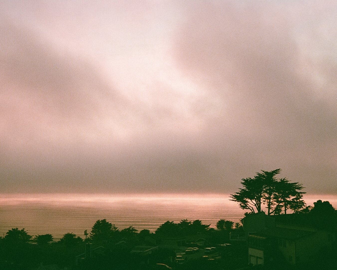 Sunset over the Pacific Ocean shot in Pacifica, CA. Shot with a Minolta CLE on Kodak Gold 400.