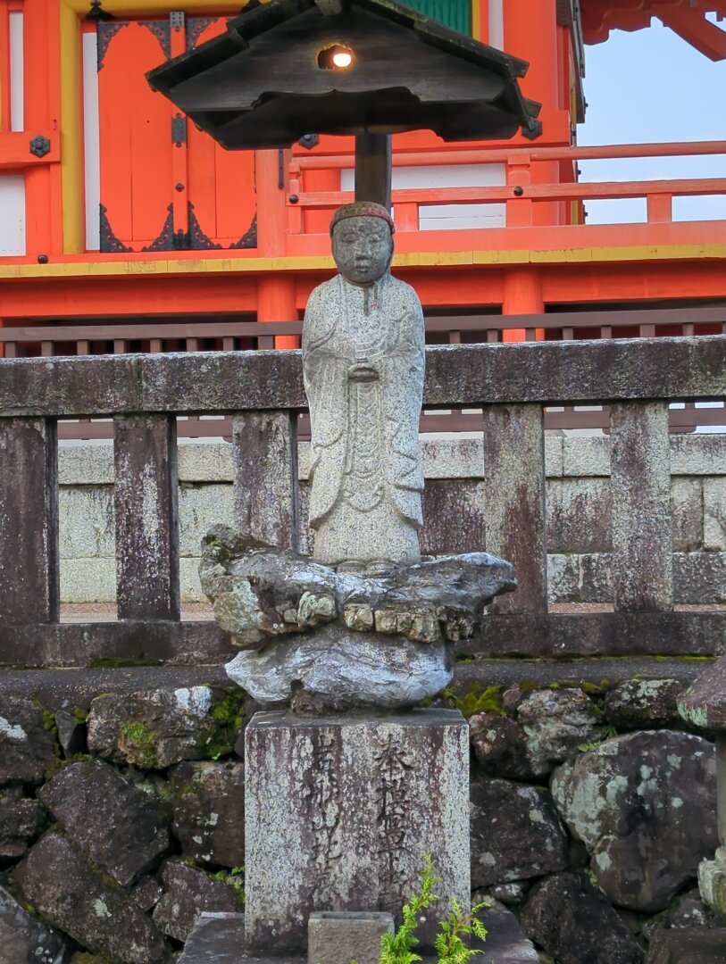 Jizo statue inside Kyomizudera temple grounds in Kyoto
