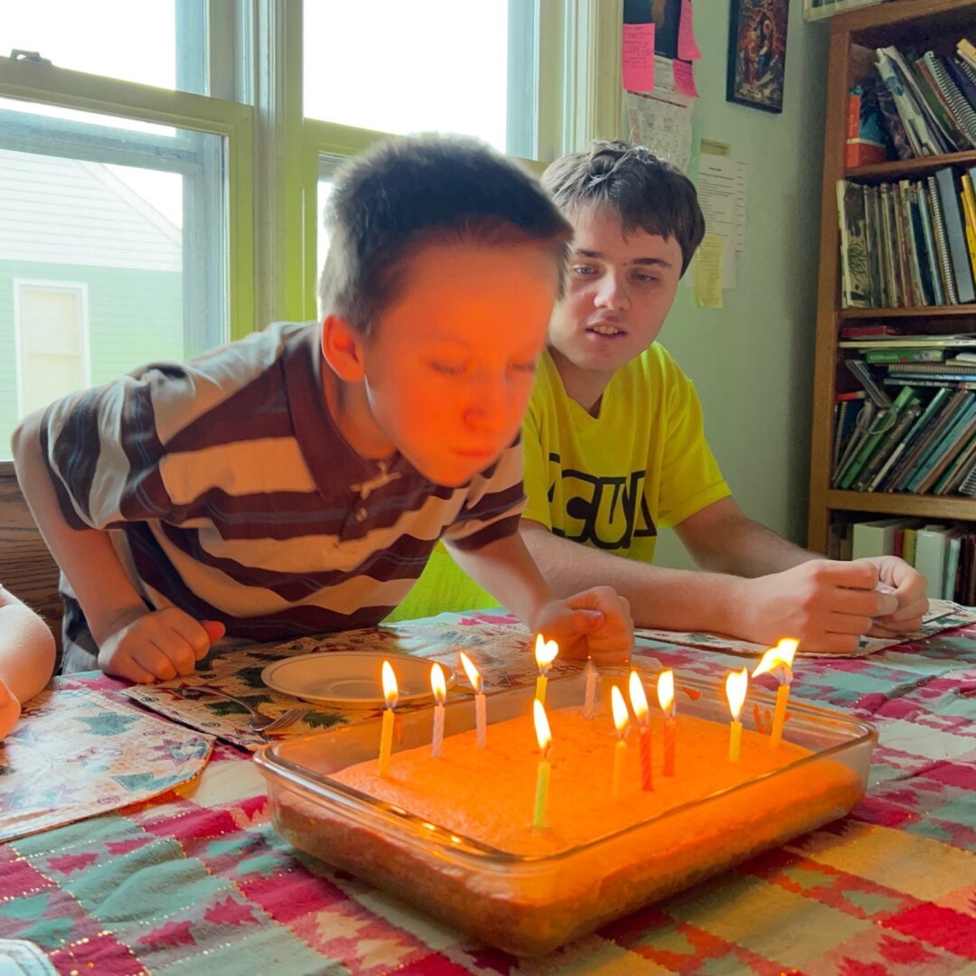 Gregory blowing out 12 candles