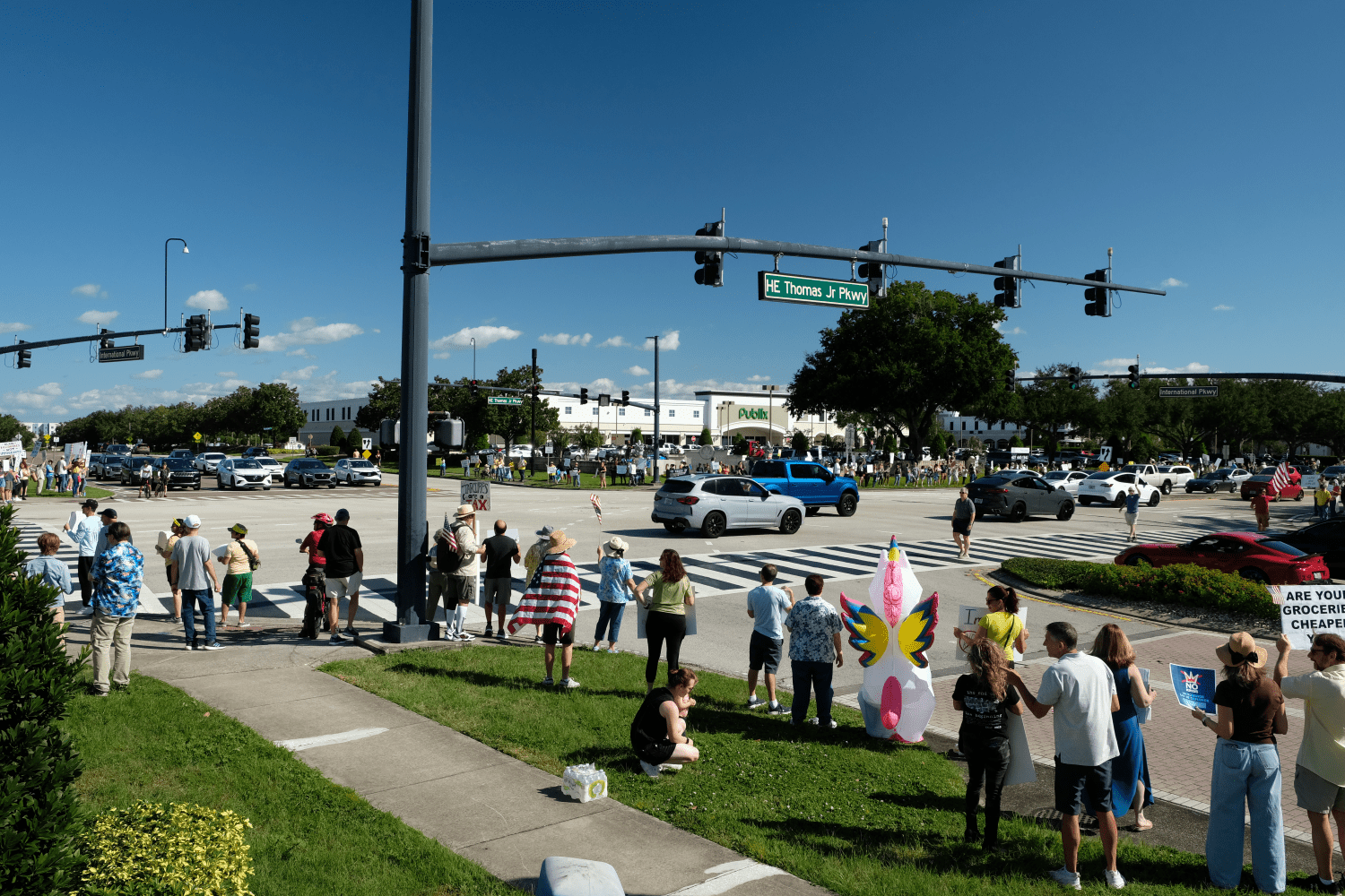 Slightly elevated shot of the intersection of SR 46-A and International Pkwy in Lake Mary/Sanford. Protesters line all four corners of the intersection.