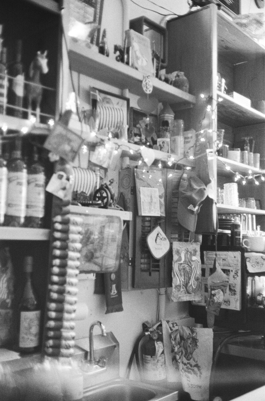 knickknacks seen on the shelves at Royal Cuckoo Market, including toy horses and viking ships