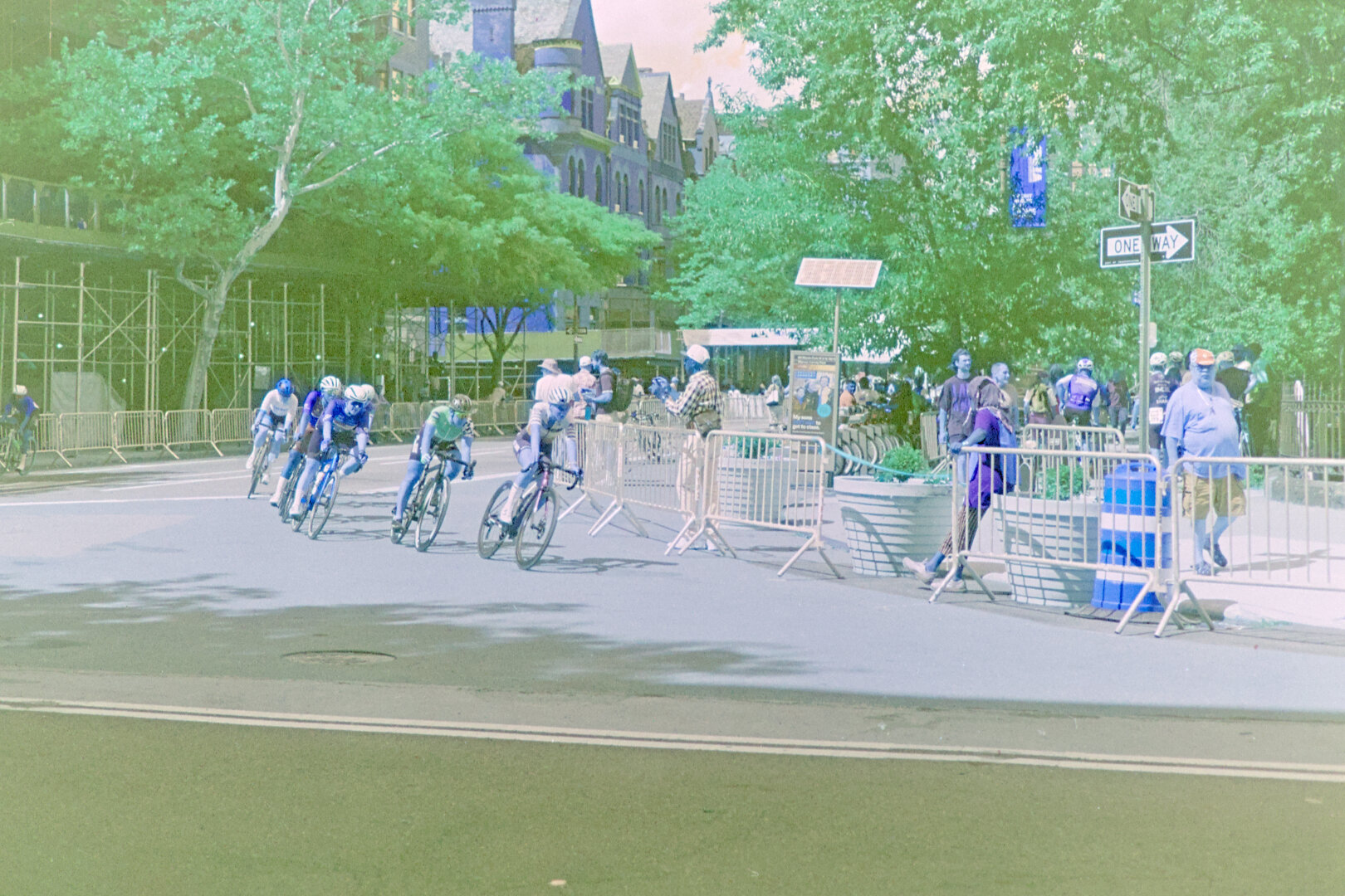 Same scene, with more cyclists at the curve. Used a faster shutter speed so no motion blur.