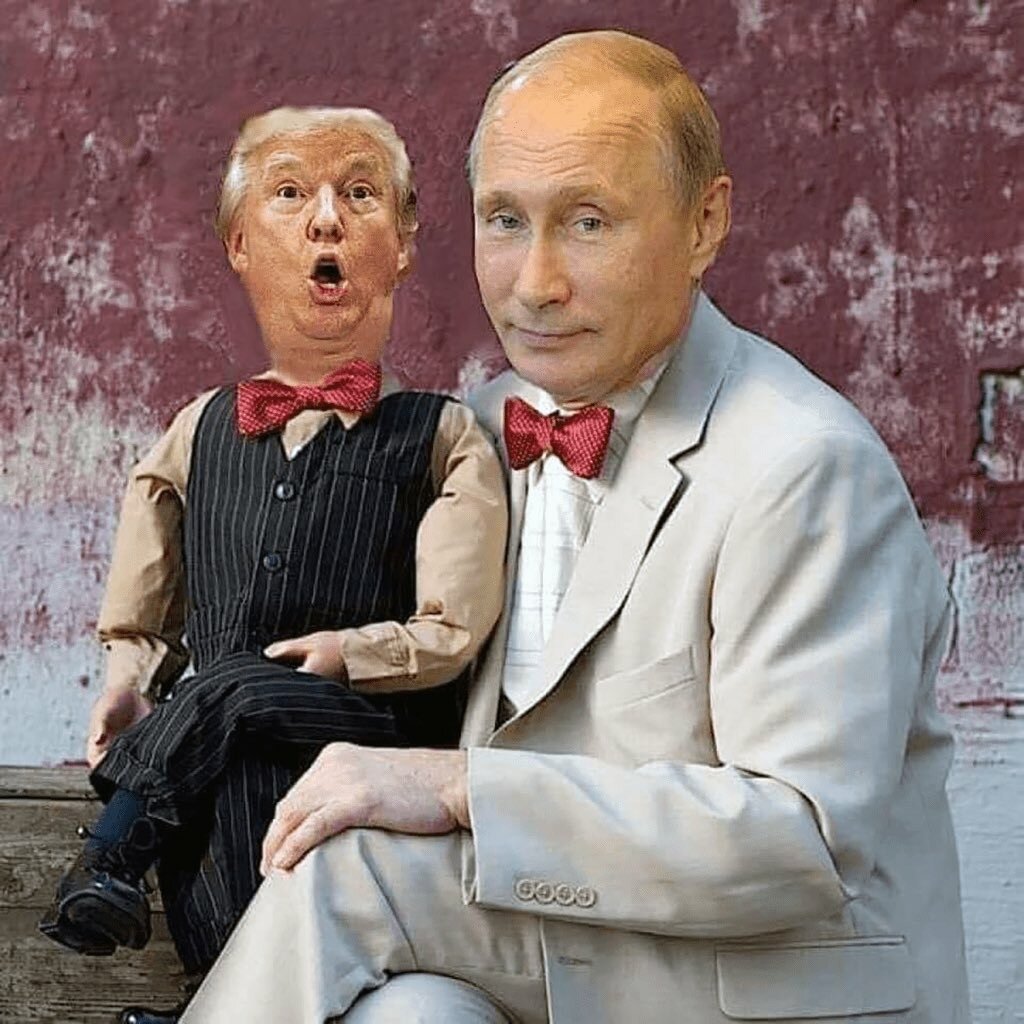 Image of Vladimir Putin seated with a Trump puppet at his side.