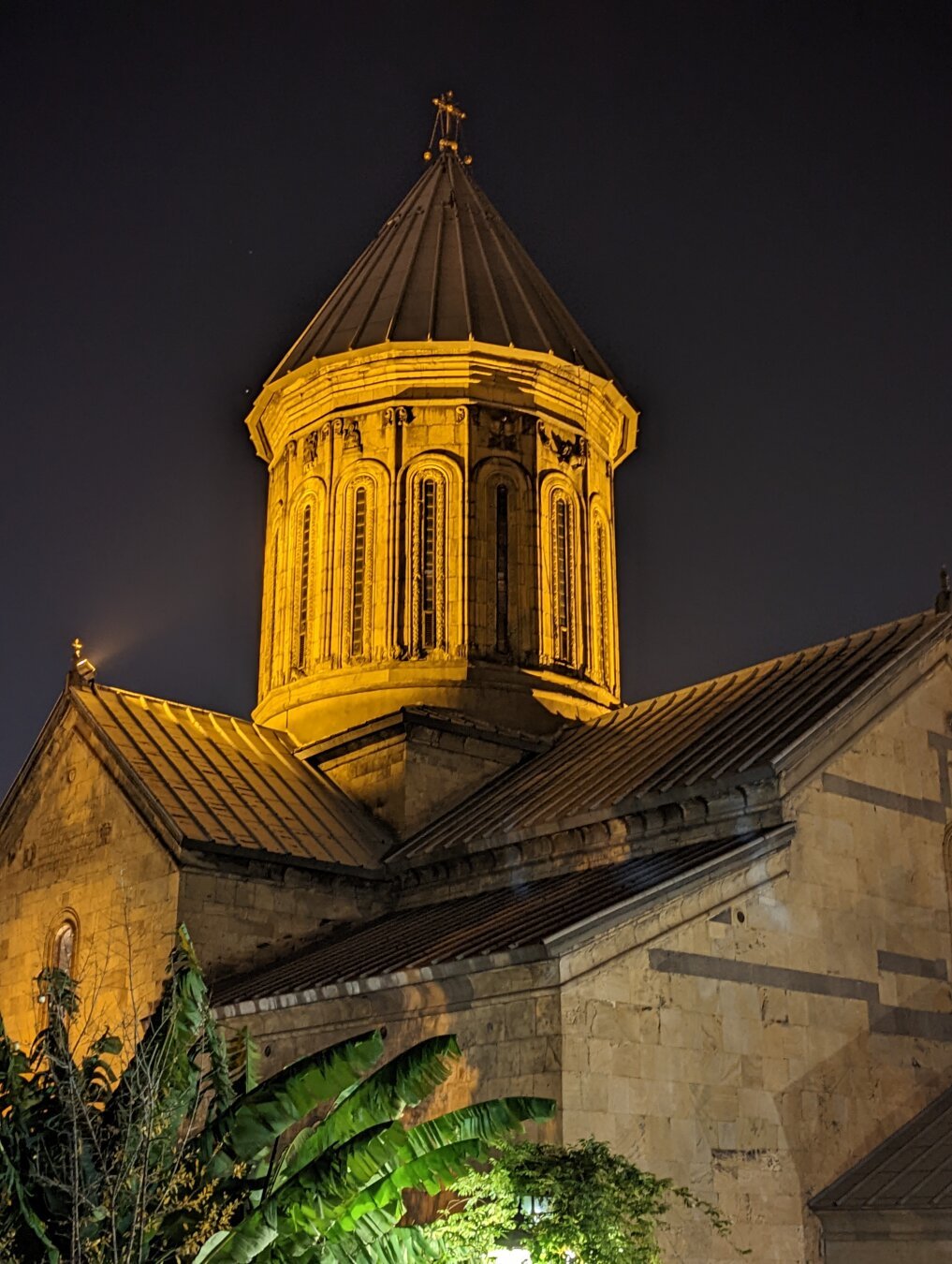 night photo of Zion Cathedral of Tbilisi from the ground 
The photo shows the dome built in medieval Georgian church style.