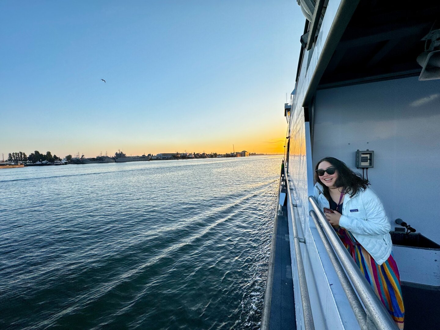A friend on the ferry with the sunset behind