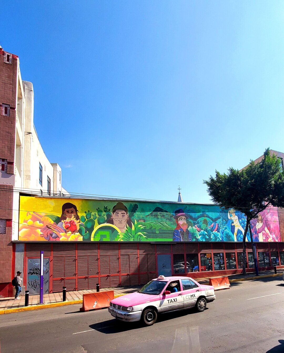 Artwork by unknown artist visible from the Cablebús gondolas as they glide over Iztapalapa in Mexico City