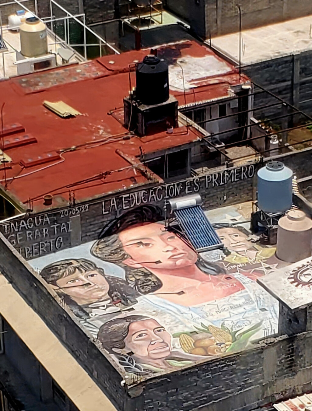 Artwork by unknown artist visible from the Cablebús gondolas as they glide over Iztapalapa in Mexico City