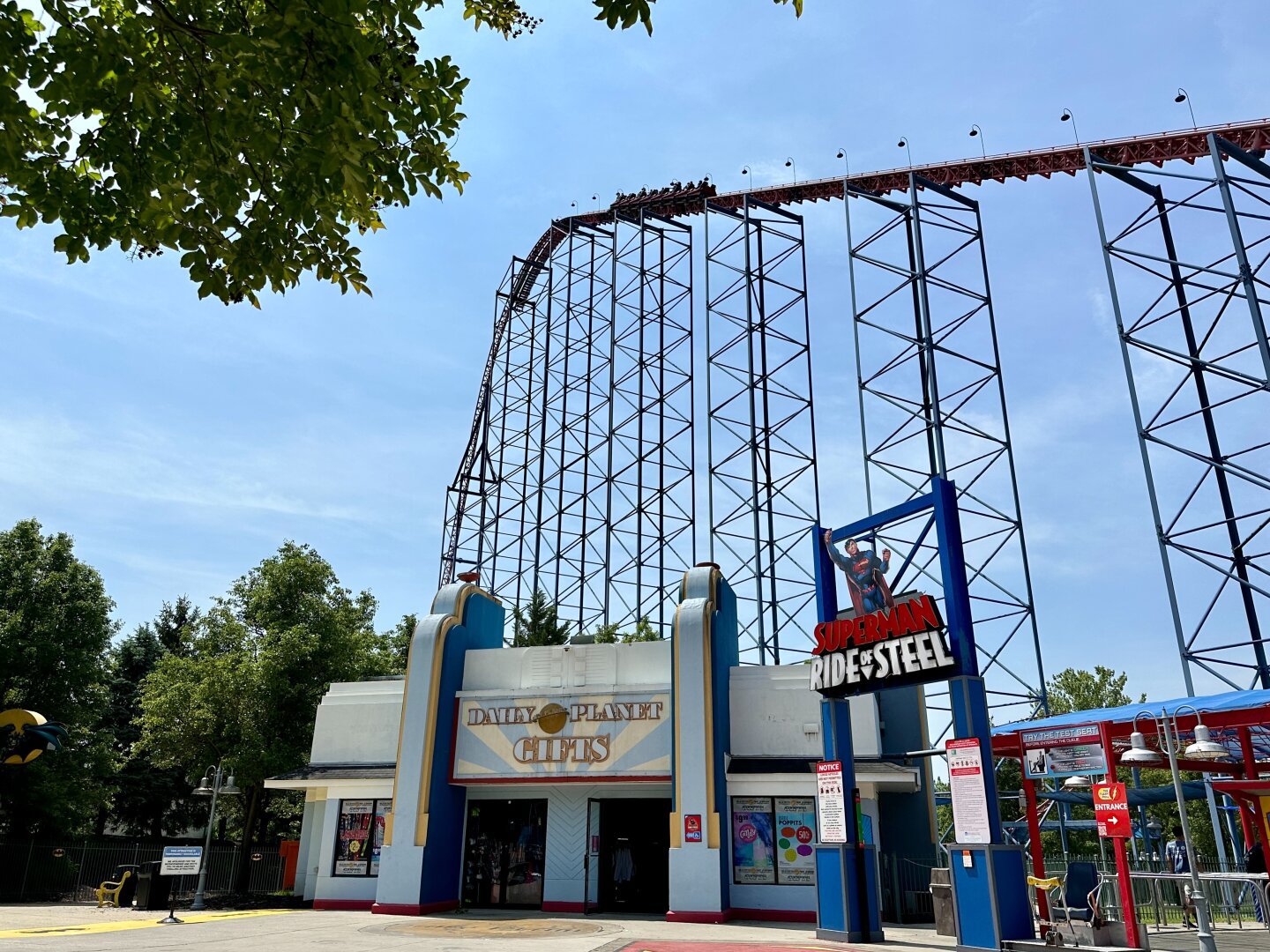 Superman: Ride of Steel at Six Flags America entrance and lift hill with the red train ascending the lift hill