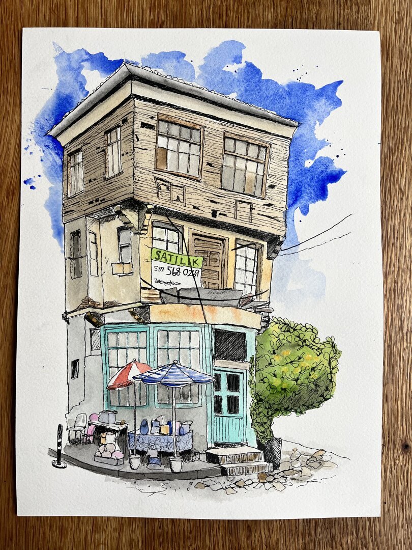 A sketch of a Turkish building half empty but with character