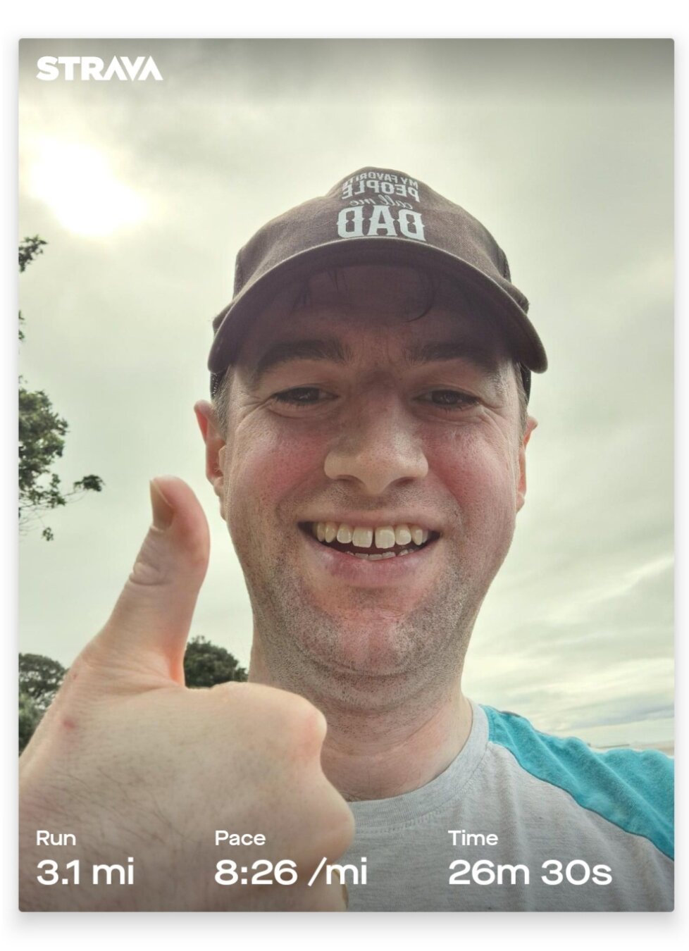 A man wearing a black baseball cap smiles and holds one thumb up.
Below it reads
Distance: 3.1 miles
Pace: 8:26 per mile
Time: 26 minutes, 30 seconds