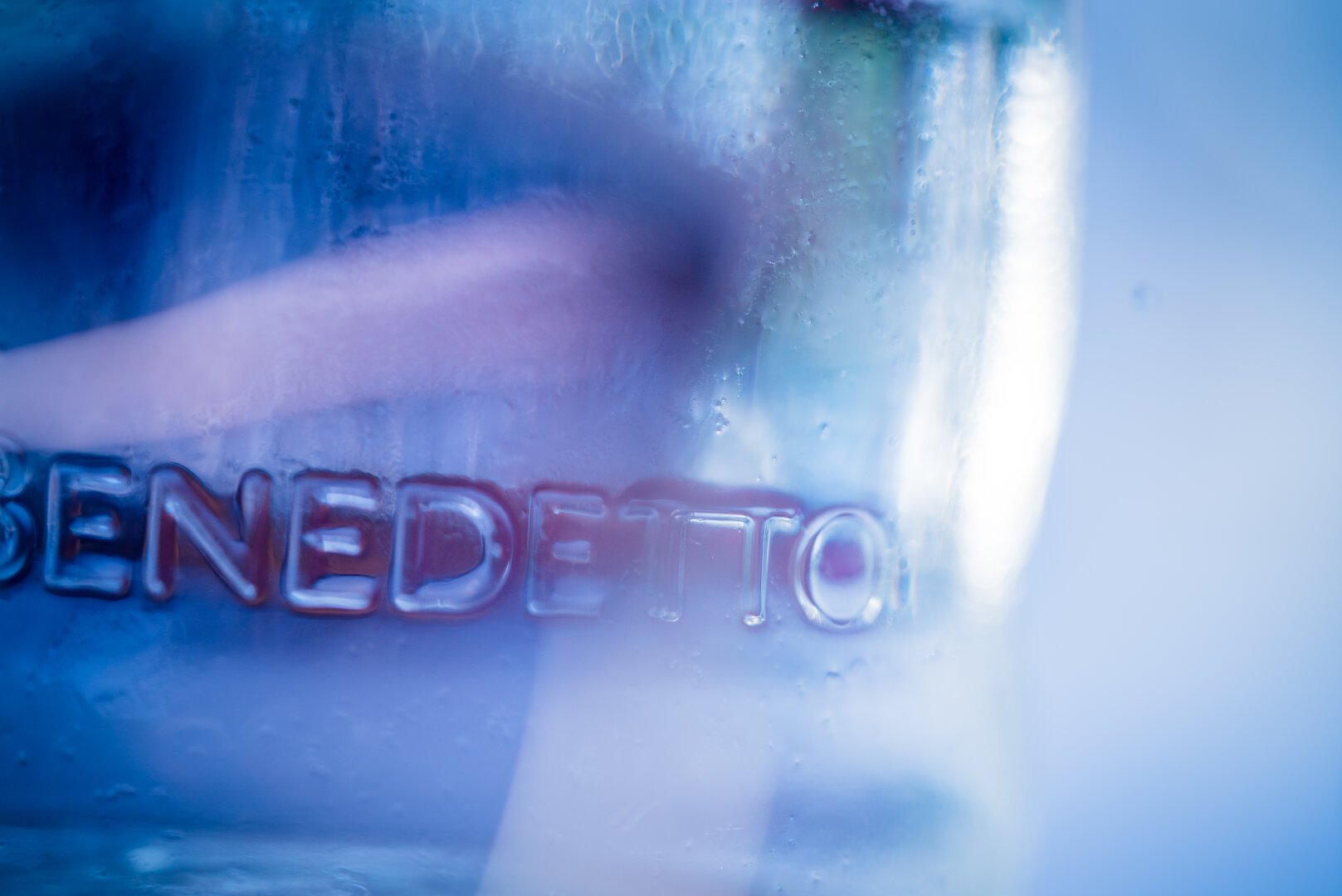 A macro shot of a San Benedetto water bottle