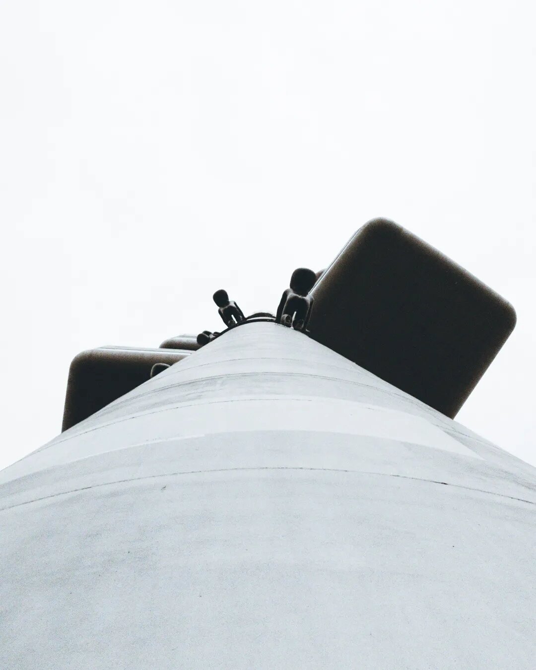 Photo from the ground level of the TV tower in Prague.
Attached to the tower are 10 statuettes by renowned sculptor David Cerny, depicting infants crawling up and down the structure.